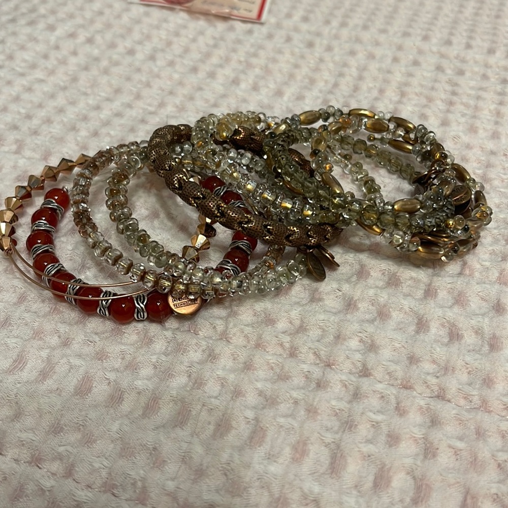 Stack of 9 Alex & Ani bracelets